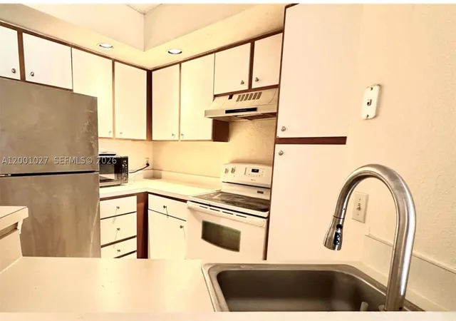 Photo 1 of Condo for sale at 3310 N Pinewalk Dr N #1823, Margate, FL 33063 | MLS# A12001027 | Listing updated on 2026-04-16