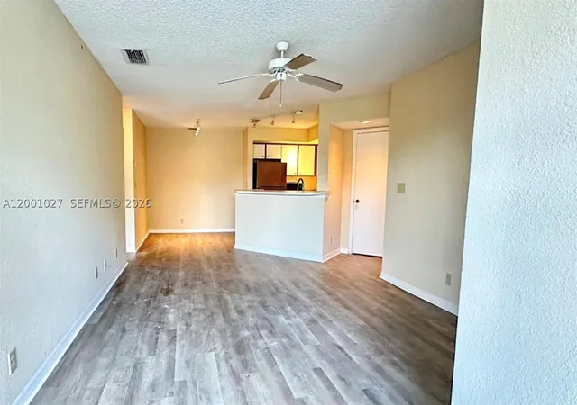 Listing Photo 1 - Condo for sale in building located at 3310 N Pinewalk Dr N, Margate, FL 33063 - Unit #1823