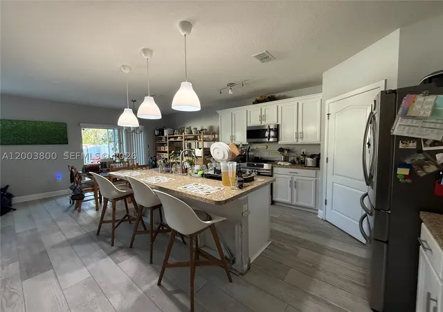 Photo 3 of Single family home for sale at 1874 Hickory Bluff Rd, Kindred, FL 34744 | MLS# A12003800 | Listing updated on 2026-09-15
