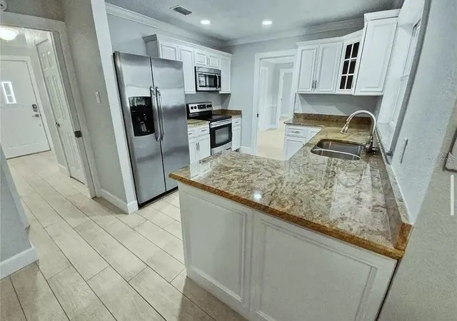4th image of 7641 Village Green Dr, Winter Park, FL 32792 | MLS# B26017812