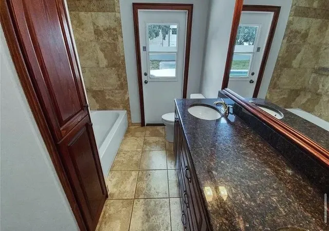 5th image of 7641 Village Green Dr, Winter Park, FL 32792 | MLS# B26017812