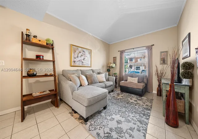 Photo 3 of Townhouse for sale at 4948 Tradewinds Ter #504, Dania Beach, FL 33312 | MLS# A12004644 | Listing updated on 2026-09-29