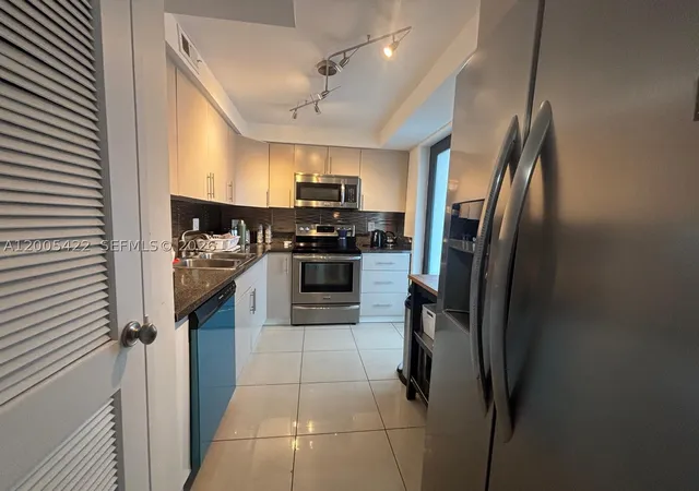 Photo 4 of Condo for sale at 301 Golden Isles Dr #409, Hallandale Beach, FL 33009 | MLS# A12005422 | Listing updated on 2026-06-03