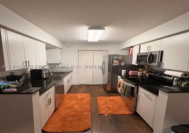 Photo 2 of Condo for sale at 833 Riverside Dr #834, Coral Springs, FL 33071 | MLS# A12005576 | Listing updated on 2026-04-22