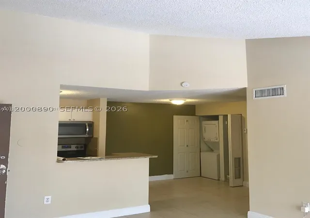 Photo 3 of Condo for sale at 7200 Nw 179th St #302, Hialeah, FL 33015 | MLS# A12000890 | Listing updated on 2026-04-23