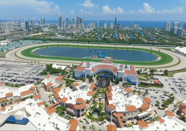 Listing Photo 2 - Condo for sale in building located at 427 Golden Isles Dr, Hallandale Beach, FL 33009 - Unit #7J