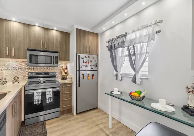 Photo 1 of Condo for sale at 2850 Somerset Dr #410L, Lauderdale Lakes, FL 33311 | MLS# A12010693 | Listing updated on 2026-05-02