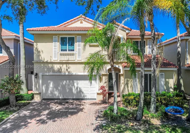 Photo 1 of Single family home for sale at 1065 Weeping Willow Way, Hollywood, FL 33019 | MLS# A12010595 | Listing updated on 2026-10-08