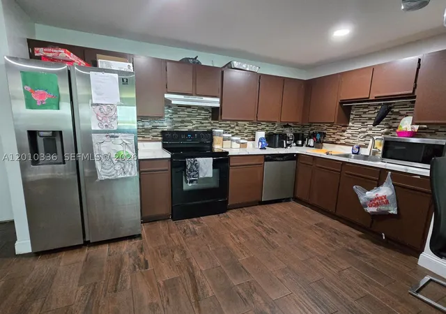 Photo 2 of Condo for sale at 14820 Naranja Lakes Blvd #D2H, Homestead, FL 33032 | MLS# A12010336 | Listing updated on 2026-08-03