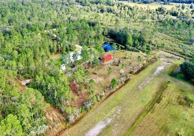 1st image of 1000 Ne 365 Lane, Okeechobee, FL 34972 | MLS# A12011820