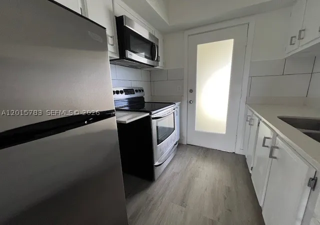 1st image of 1350 E Sample Rd #306, Pompano Beach, FL 33064 | MLS# A12015783