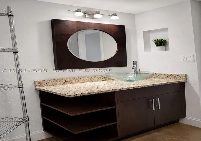 Photo 4 of Condo for sale at 2890 N Oakland Forest Dr #203, Oakland Park, FL 33309 | MLS# A12014596 | Listing updated on 2026-07-23