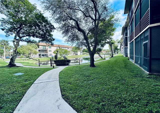 Homes for sale in Tamarac, FL | 6090 N Sabal Palm Boulevard, Tamarac, FL 33319 | Houzeo