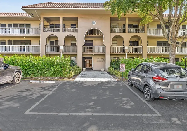 1st image of 100 Royal Palm Wy, Boca Raton, FL 33480