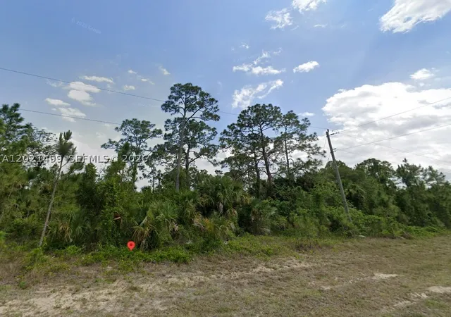 1st image of 5010 Ne Tradewinds Circle, La Belle, FL 33935 | MLS# A12021499