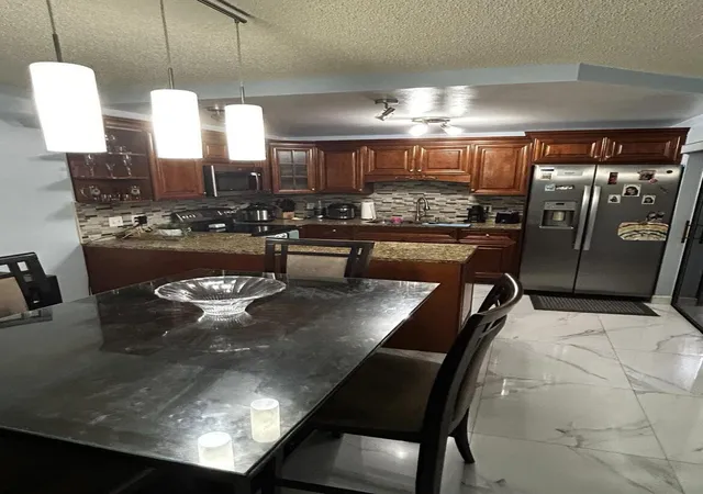 4th image of 341 Lake Arbor Dr, Palm Springs, FL 33461 | MLS# B26031955