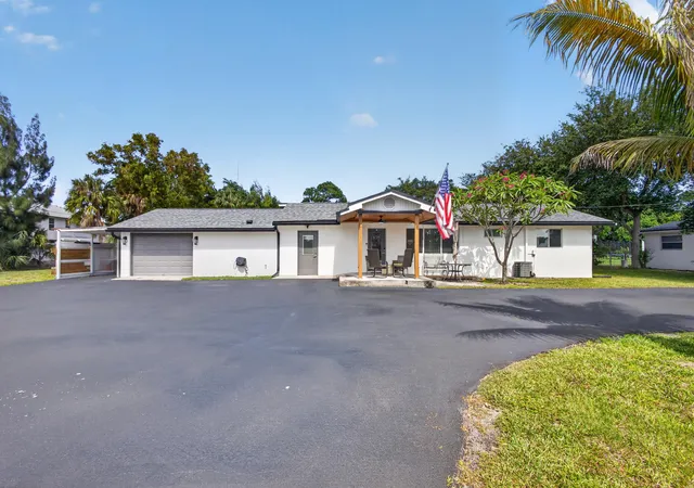 Homes for sale in Mangonia Park, FL | 5500 West Pl, Mangonia Park, FL 33407 | MLS# B26032099