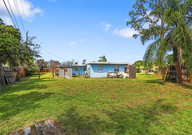 Photo 2 of Single family home for sale at 310 E Olive Ave, Port St Lucie, FL 34952 | MLS# A12025477 | Listing updated on 2026-08-22