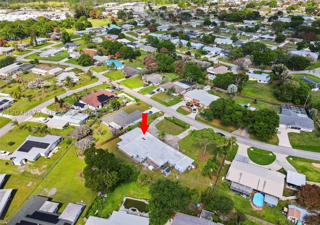 Photo 3 of Single family home for sale at 310 E Olive Ave, Port St Lucie, FL 34952 | MLS# A12025477 | Listing updated on 2026-08-22
