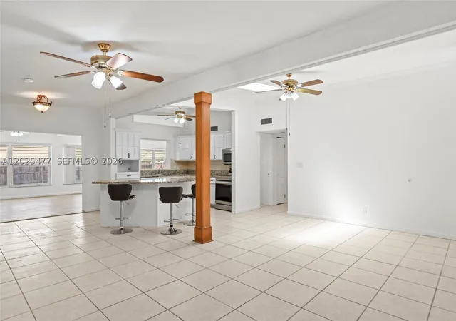 Photo 4 of Single family home for sale at 310 E Olive Ave, Port St Lucie, FL 34952 | MLS# A12025477 | Listing updated on 2026-08-22
