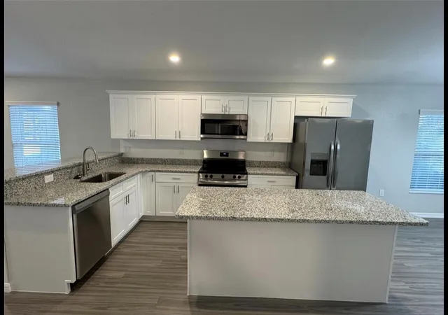 2nd image of 412 Ne Avenue M Ne, Winter Haven, FL 33881 | MLS# B26034930