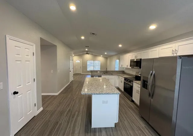 3rd image of 412 Ne Avenue M Ne, Winter Haven, FL 33881 | MLS# B26034930