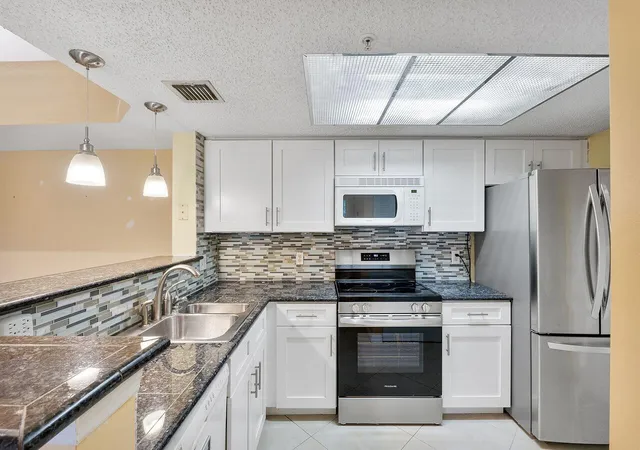 2nd image of 5011 Wiles Rd #Unit 303, Coconut Creek, FL 33073 | MLS# B26035654