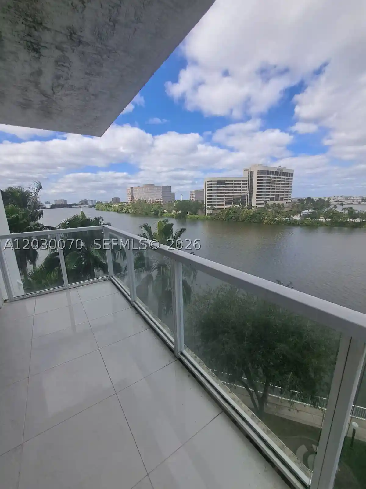 Listing Photo 1 - Condo for sale in Blue Lagoon Condominiums located at 5085 Nw 7Th St, Miami, FL 33126 - Unit #602