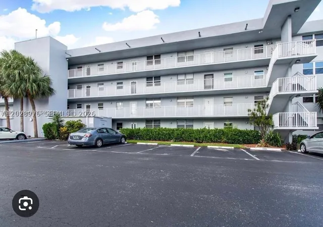Photo 1 of Condo for sale at 107 Royal Park Dr #4F, Oakland Park, FL 33309 | MLS# A12028976 | Listing updated on 2026-06-06