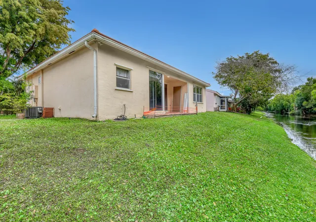 30th image of 180 Caribe Ct, Greenacres, FL 33413 | MLS# B26036796