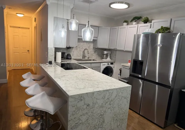 Photo 2 of Condo for sale at 500 Layne Blvd #12, Hallandale Beach, FL 33009 | MLS# A12033001 | Listing updated on 2026-10-08
