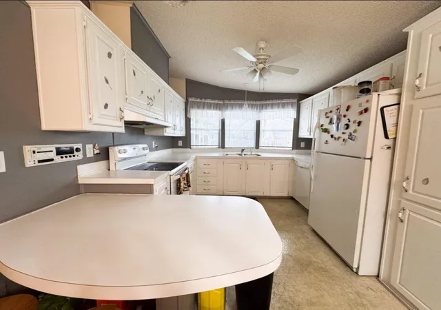 4th image of 120 Plantation Blvd #120, Lake Worth, FL 33467 | MLS# B26040555