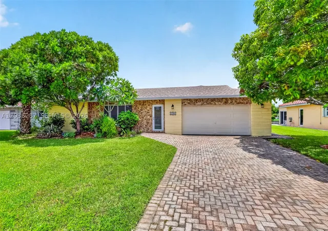 Photo 1 of Single family home for sale at 7201 Nw 93rd Ave, Tamarac, FL 33321 | MLS# A12036287 | Listing updated on 2026-10-08