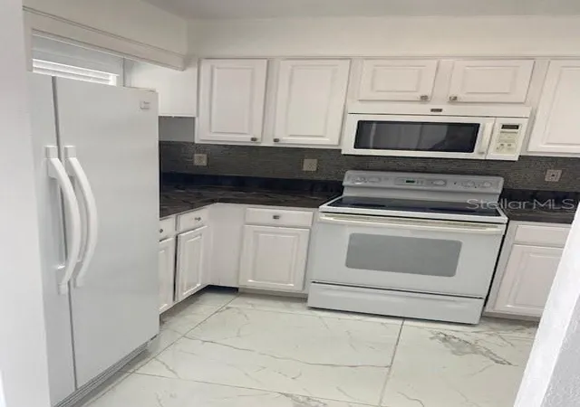 4th image of 1820 Amberly Ave #T-10, Orlando, FL 32822 | MLS# B26042012