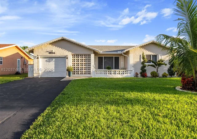 Photo 1 of Single family home for sale at 8014 Nw 101st Ave, Tamarac, FL 33321 | MLS# A12037488 | Listing updated on 2026-08-03