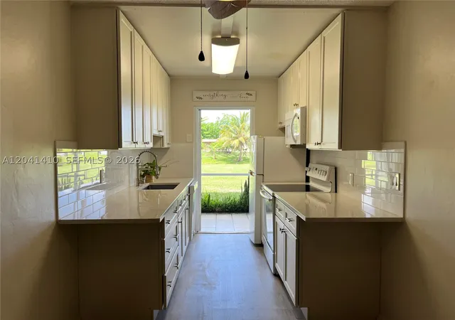 Photo 3 of Condo for sale at 6550 Royal Palm Blvd #105A, Margate, FL 33063 | MLS# A12041410 | Listing updated on 2026-06-23