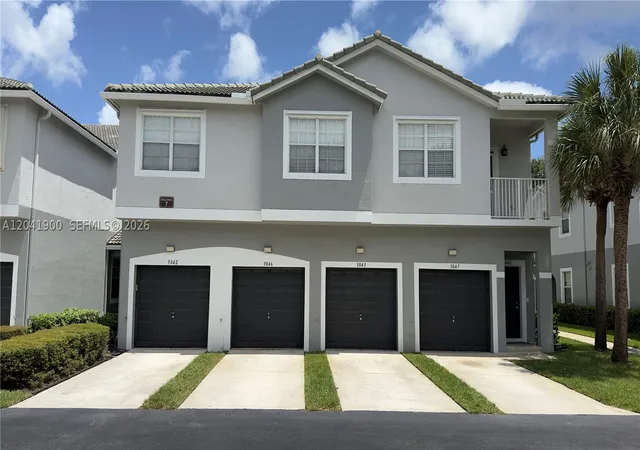 Photo 1 of Townhouse for sale at 3042 Grandiflora Dr, Green Acres, FL 33467 | MLS# A12041900 | Listing updated on 2026-10-07