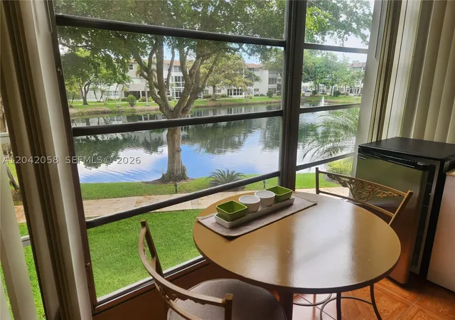 Listing Photo 1 - Condo for sale in building located at 5001 Nw 34Th St, Lauderdale Lakes, FL 33319 - Unit #205