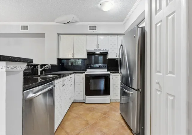 2nd image of 1721 Village Blvd #104, West Palm Beach, FL 33409 | MLS# A12042536