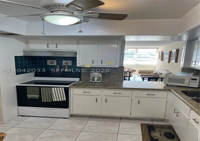 Photo 2 of Condo for sale at 1351 Ne Miami Gardens Dr #222E, Miami, FL 33179 | MLS# A12042033 | Listing updated on 2026-08-08