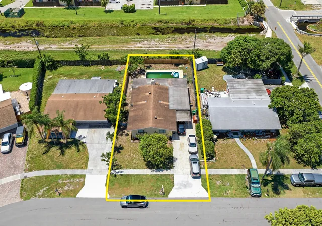 1st image of 18 Andros Rd, Palm Springs, FL 33461 | MLS# B26045513