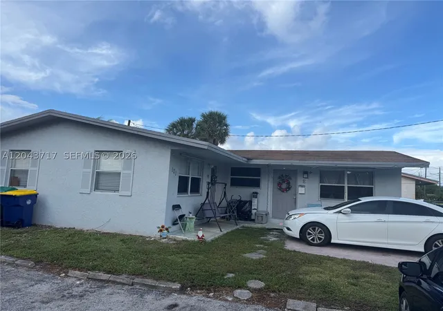 Photo 1 of Multi family home for sale at 101 Nw 13th Ave, Dania, FL 33004 | MLS# A12043717 | Listing updated on 2026-07-07