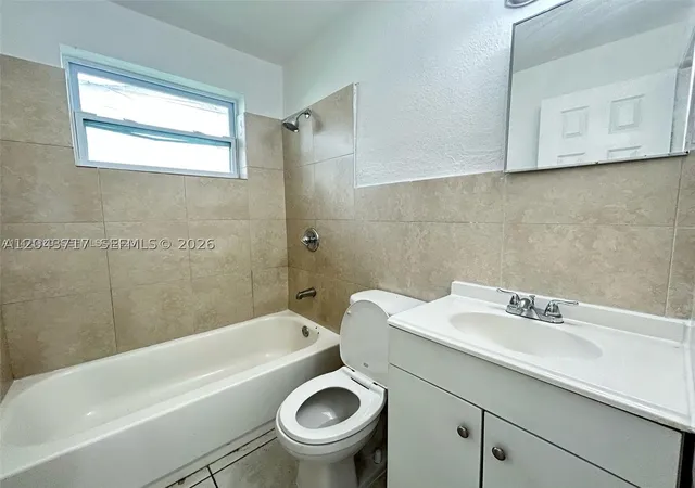 Photo 3 of Multi family home for sale at 101 Nw 13th Ave, Dania, FL 33004 | MLS# A12043717 | Listing updated on 2026-07-07