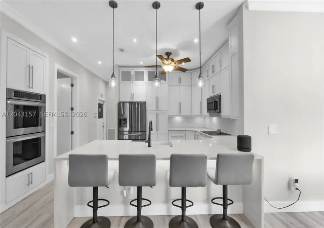Photo 2 of Single family home for sale at 720 S Old Nob Hill Rd, Plantation, FL 33324 | MLS# A12043157 | Listing updated on 2026-10-09