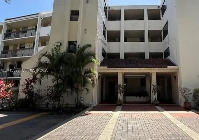 Listing Photo 1 - Condo for sale in building located at 109 Lake Emerald Dr, Oakland Park, FL 33309 - Unit #105