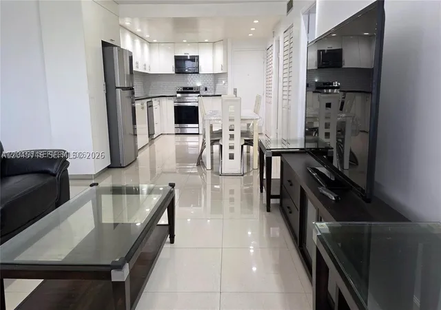 Photo 1 of Condo for sale at 1351 Ne Miami Gardens Dr #511E, Miami, FL 33179 | MLS# A12045746 | Listing updated on 2026-10-02