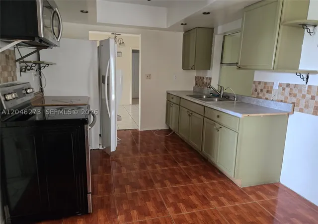 Photo 1 of Single family home for sale at 4205 Nw 52nd Ave, Lauderdale Lakes, FL 33319 | MLS# A12046273 | Listing updated on 2026-08-24