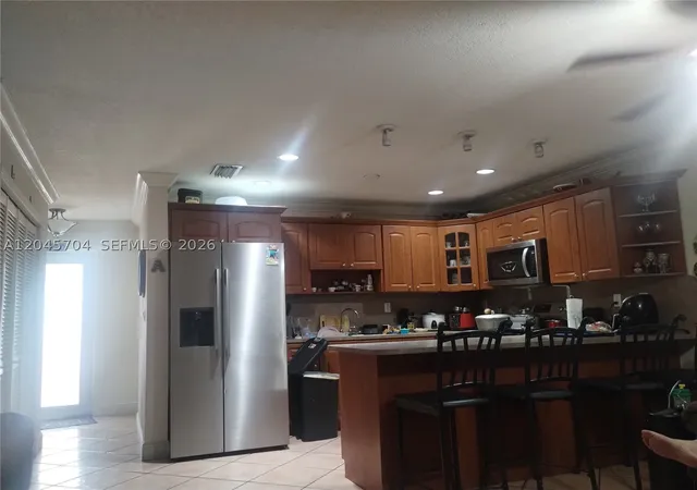 Photo 3 of Townhouse for sale at 7005 W 15th Ave, Hialeah, FL 33014 | MLS# A12045704 | Listing updated on 2026-08-11