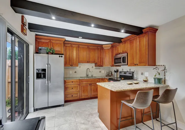 2nd image of 99 Lake Arbor Dr, Palm Springs, FL 33461 | MLS# B26047853
