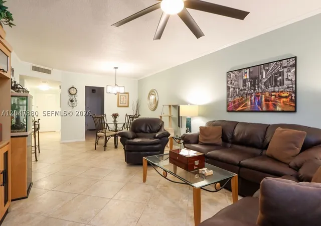 Photo 2 of Condo for sale at 3575 Broken Woods Dr #303, Coral Springs, FL 33065 | MLS# A12047880 | Listing updated on 2026-08-26